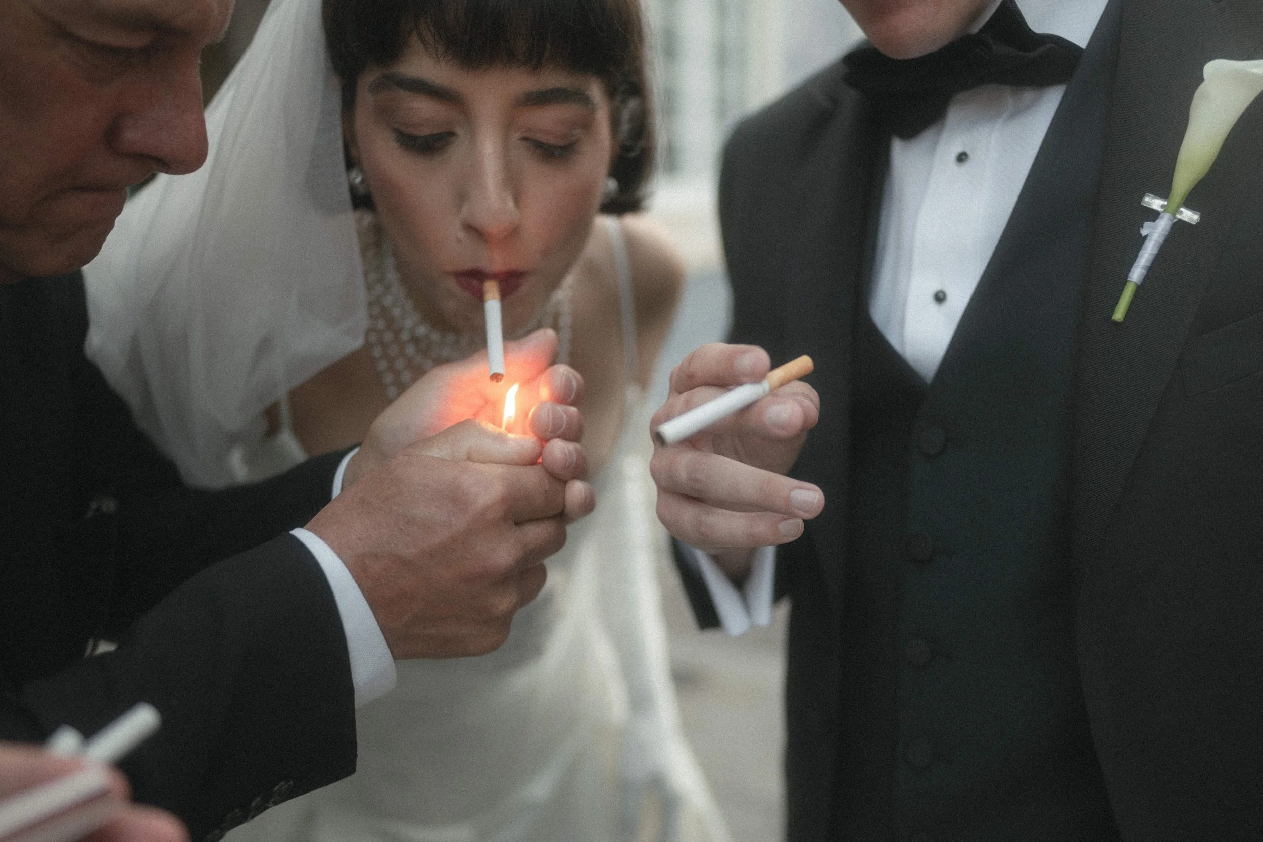 Bride Wears Pronovias Axelle Gown and light cigarette