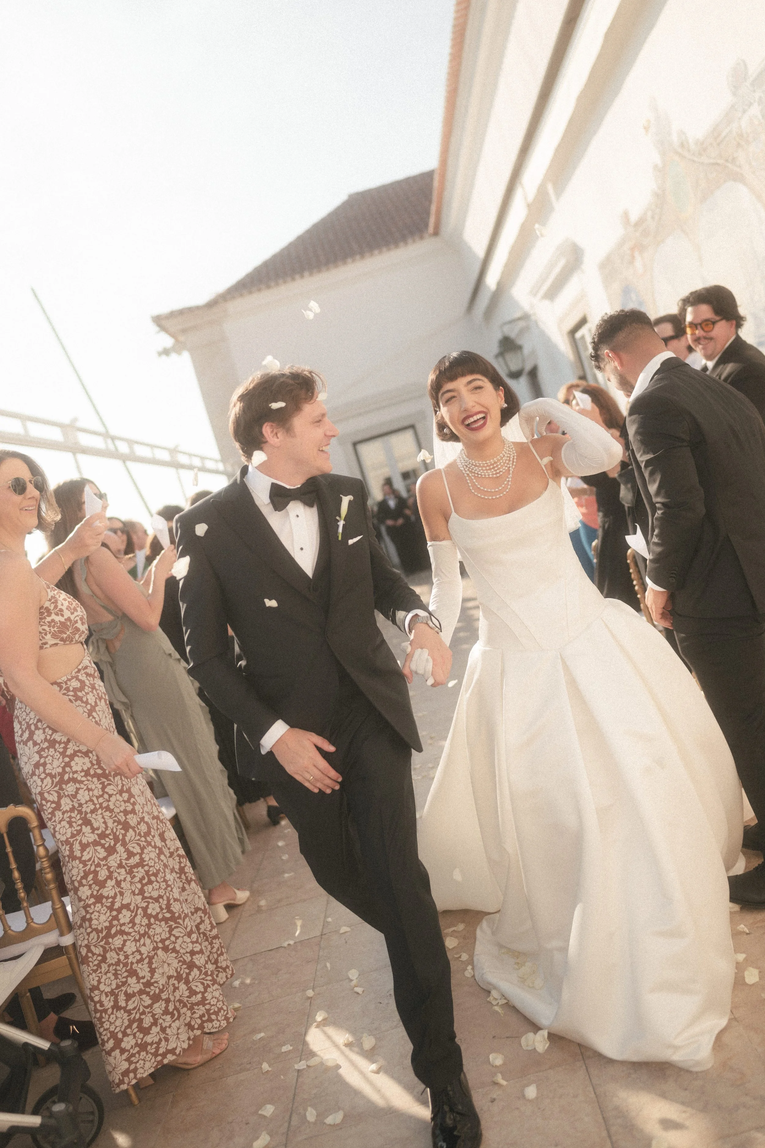 Real Bride Wears Pronovias Axelle Gown walking down the aisle