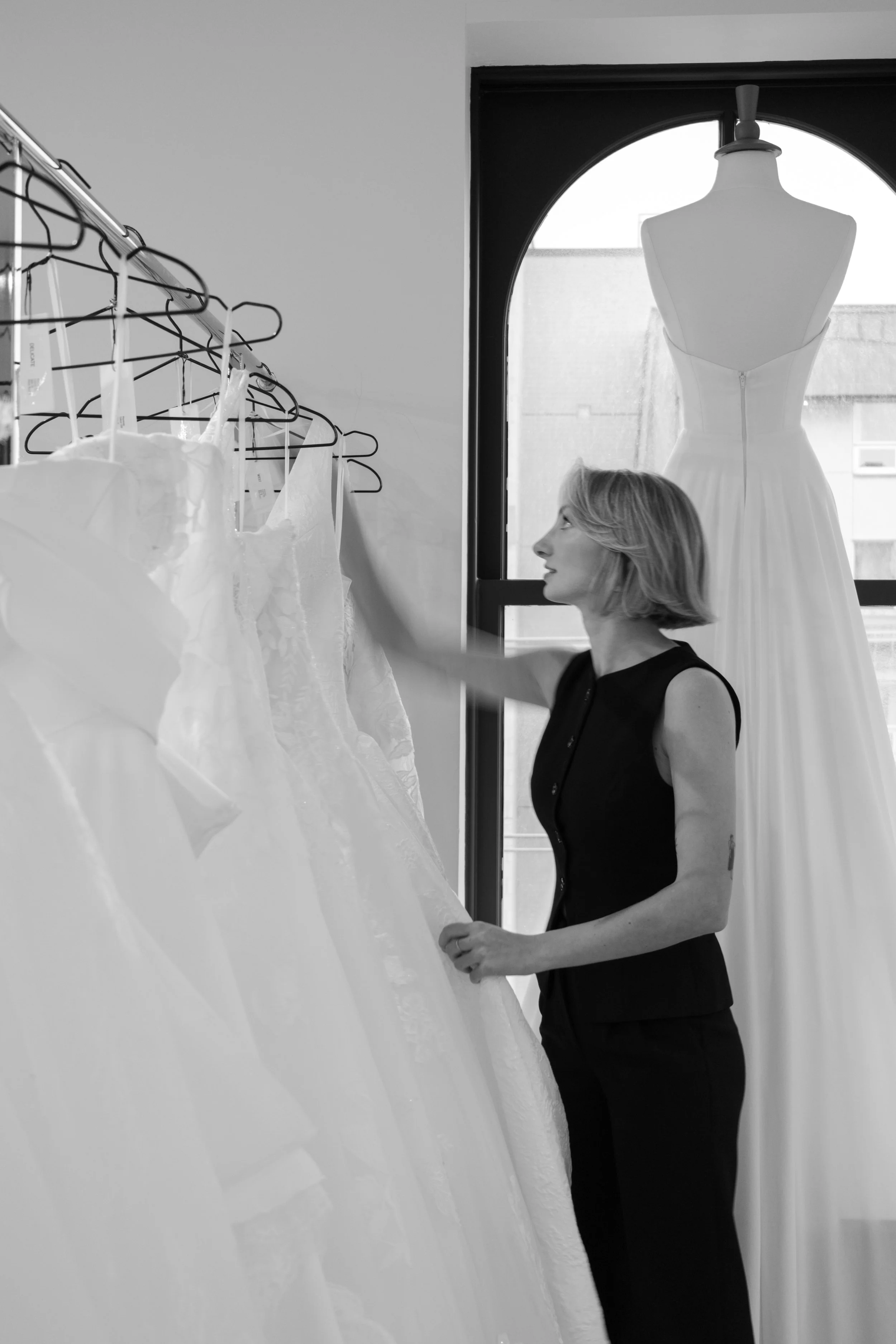TMB stylist browsing the dress loft for wedding dresses