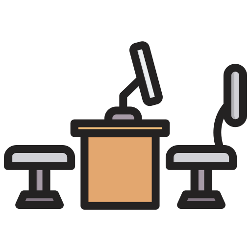 A conference room with a table and chairs, and two microphones.