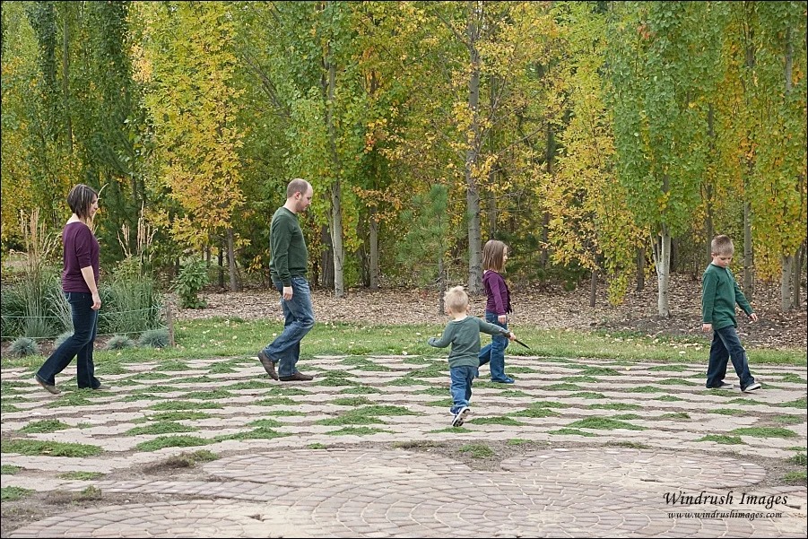 Family photograph of family walking around the labyrinth at Silver Springs Botanical Gardens in Calgary