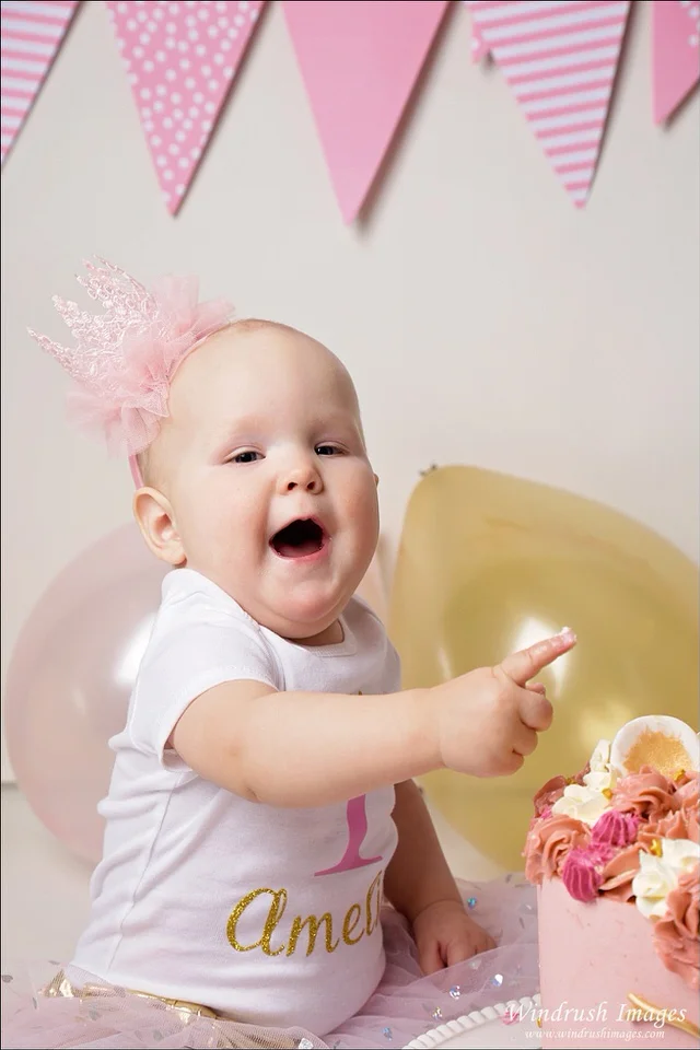 happy-little-girl-at-best-unicorn-cake-smash-photos-Calgary