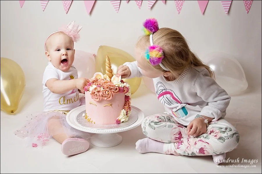 siblings-smash-cake-together-Calgary-photography