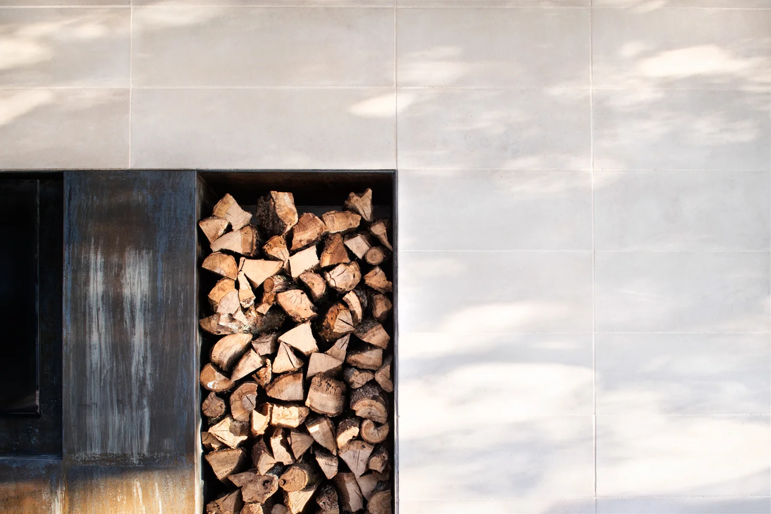 Detail View at Steel Fireplace and Stone Surround