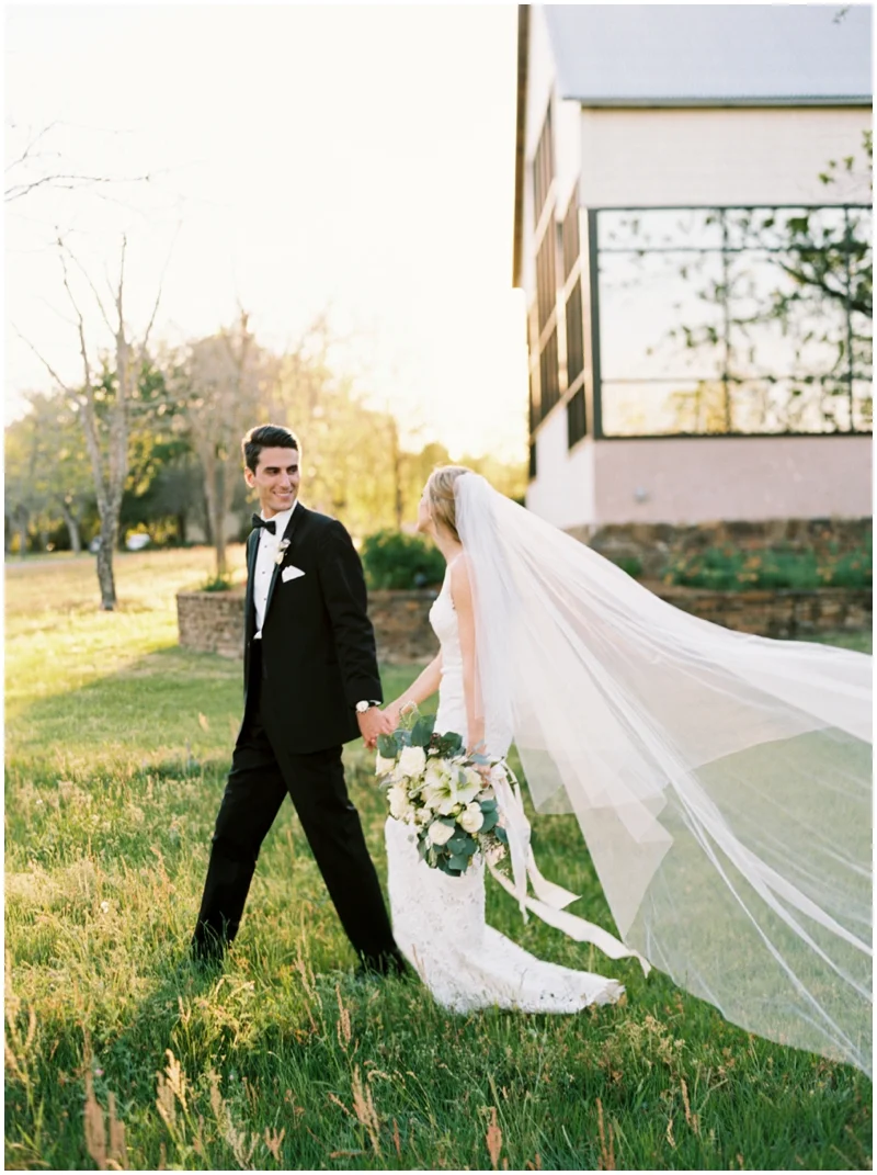The most epic veil picture at this classic black tie wedding by Top Texas Wedding Photographer Hannah Mayson