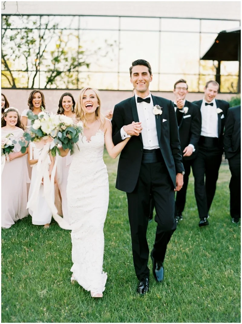 Massive Texas sized wedding party celebrates at black tie wedding by Top Texas Wedding Photographer Hannah Mayson