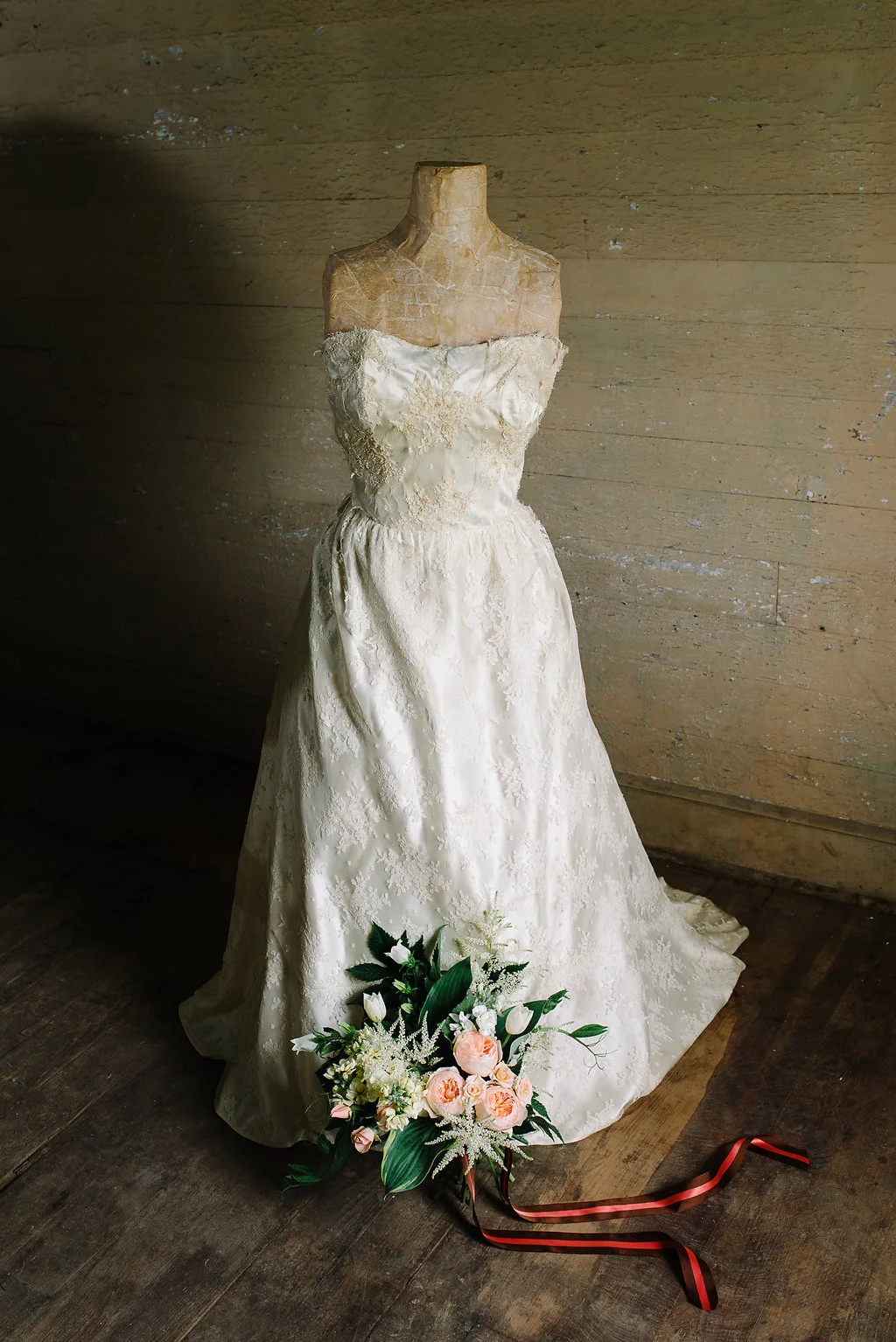 This wedding dress was worn by both my mother and sister.  It was a thrill to take it out of the box before the shoot and remember my sister’s wedding day.  It was the first wedding I had ever been in.  Photo:  Norman Photo and P…
