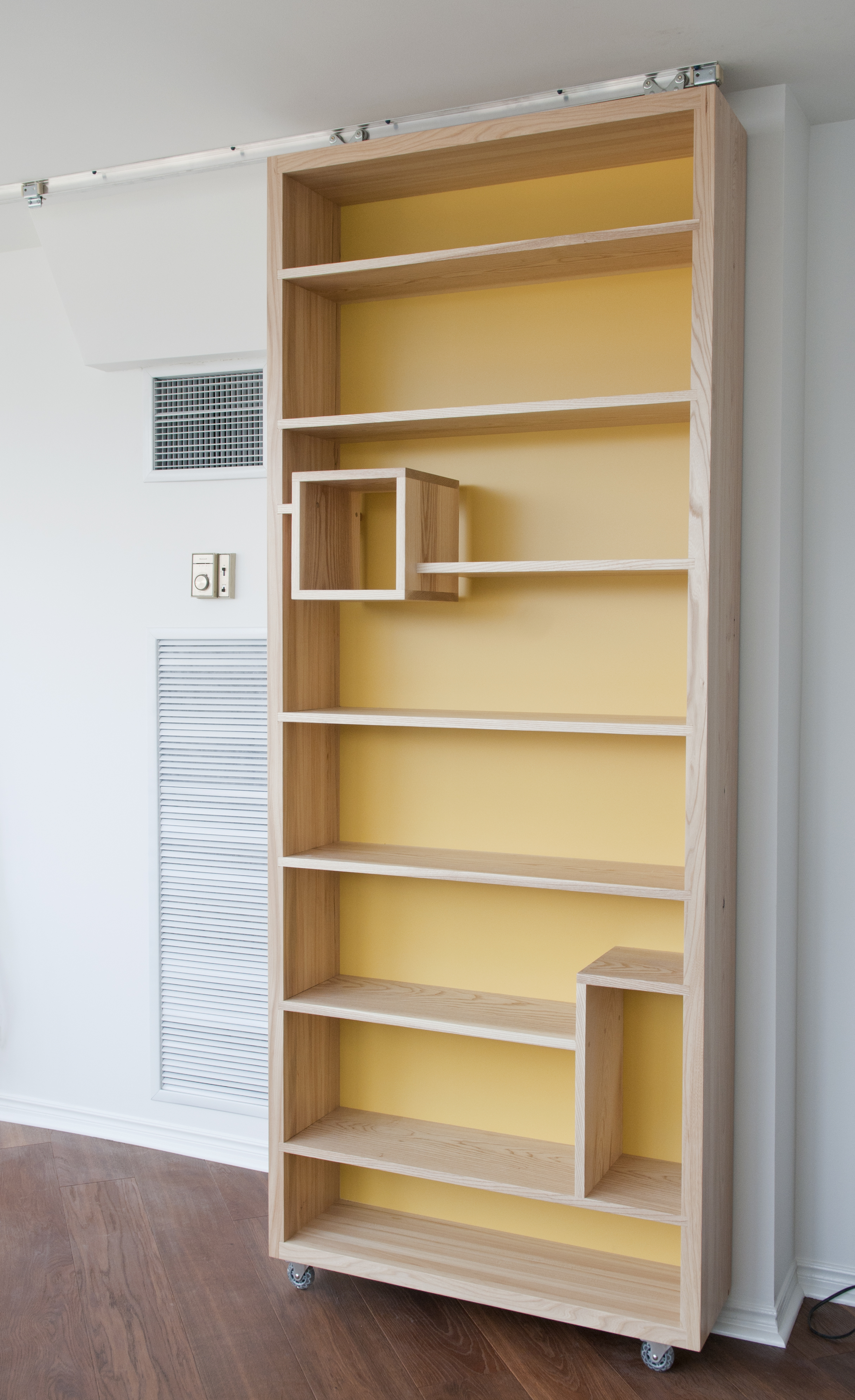 Sliding bookcase