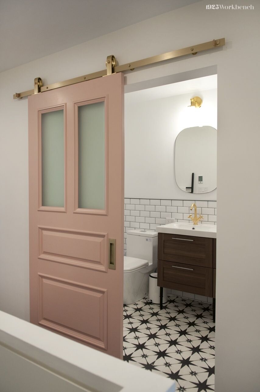 Soft pink against the black and white tiles