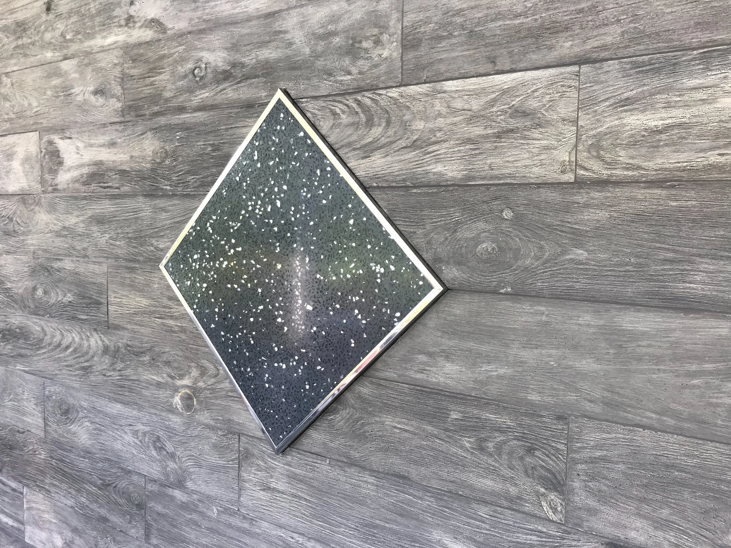 Cement planks with terrazzo keystone.jpeg