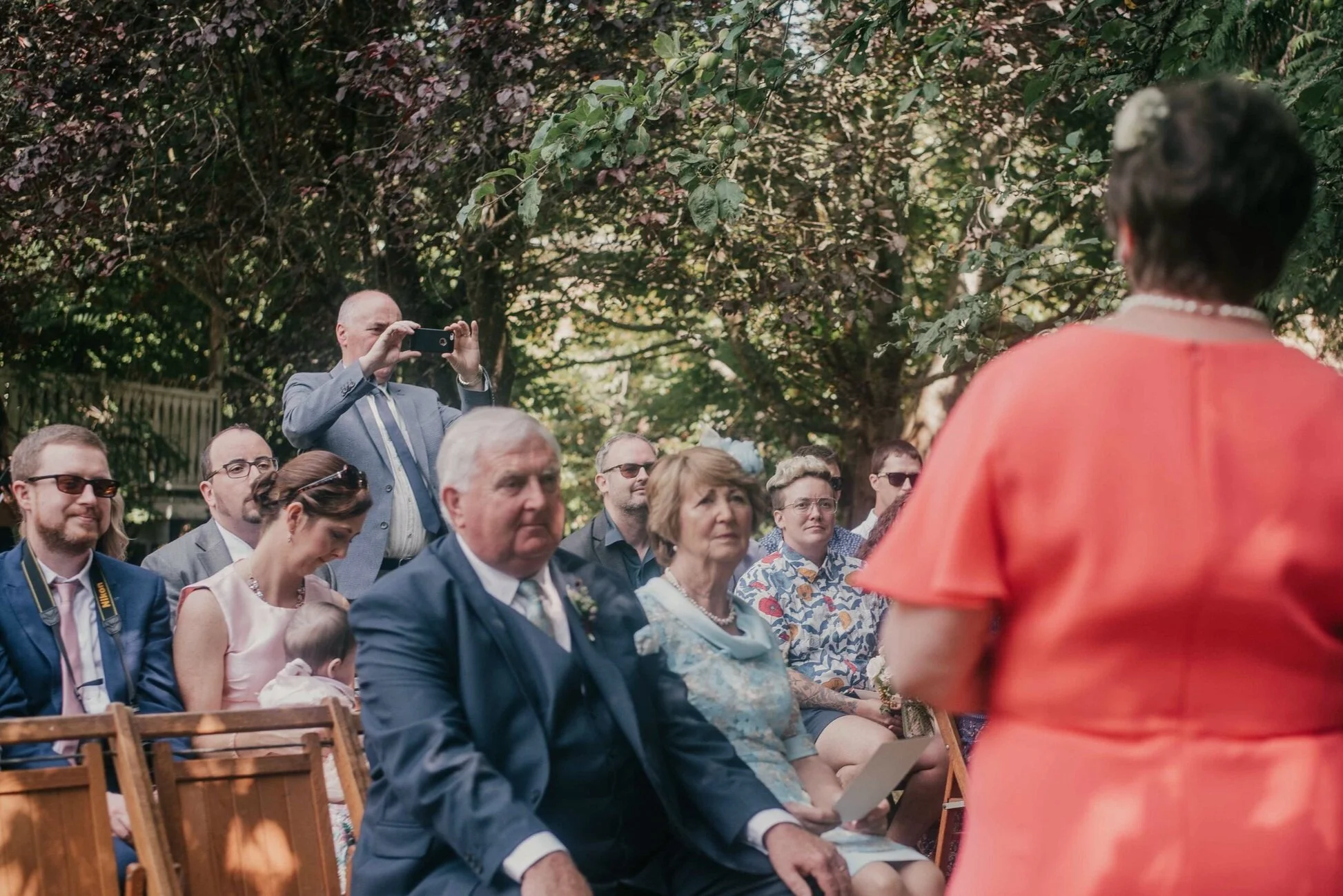 i was going for a full guest shot and this gentleman kept jumping in the aisle during the ceremony! i even asked quietly him to please sit down and he didn’t care. the couple afterward was shocked by his behavior and wished they had gone unplugged.