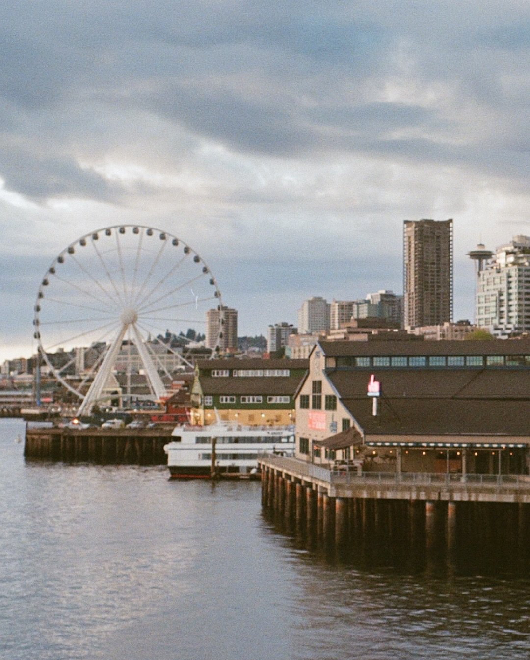 seattle waterfront sunset shot on kodak gold 35mm film with my trusty old nikon fm2 - manual focus baby. :) 

nothing has the dynamic range and character of film photography. this sunset shows it off so well! xo 

#ishootfilm #seattle #filmphotograph