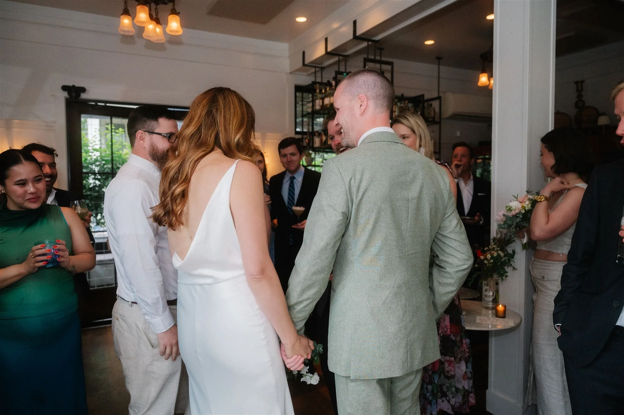 candid wedding couple enjoying their micro wedding reception in seattle