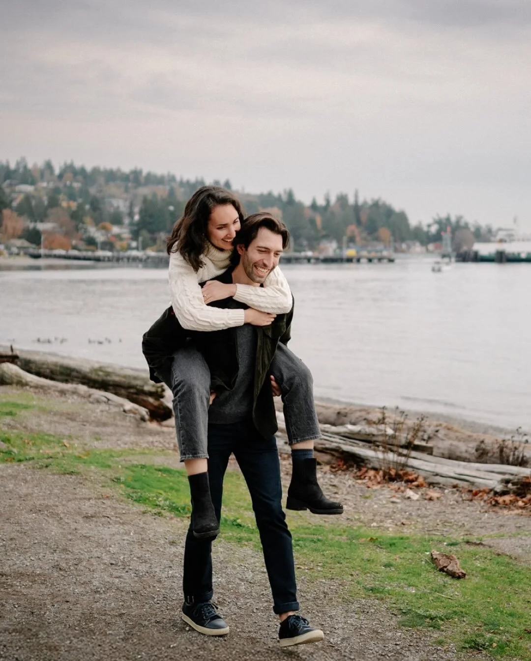 these two brought all the cozy fall vibes to their lincoln park engagement session &mdash; tossing leaves, laughing through the gentle rain, walking on the waterfront while the ferries drifted in and out behind us, and yes&hellip; kissing in a rainy 
