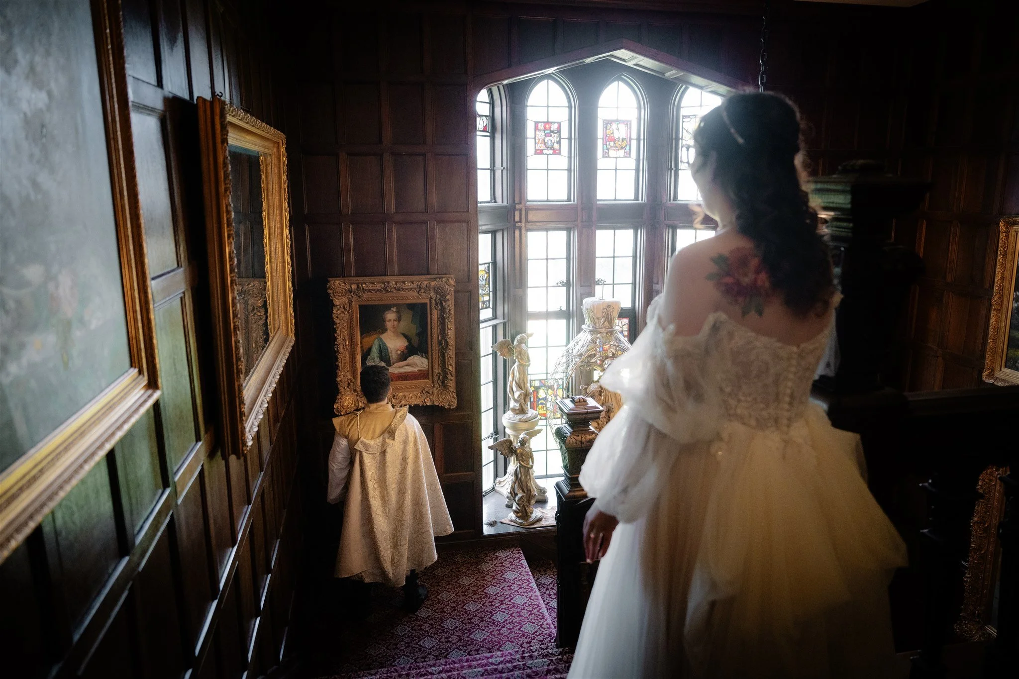 bride and groom first look on the steps at thornewood castle