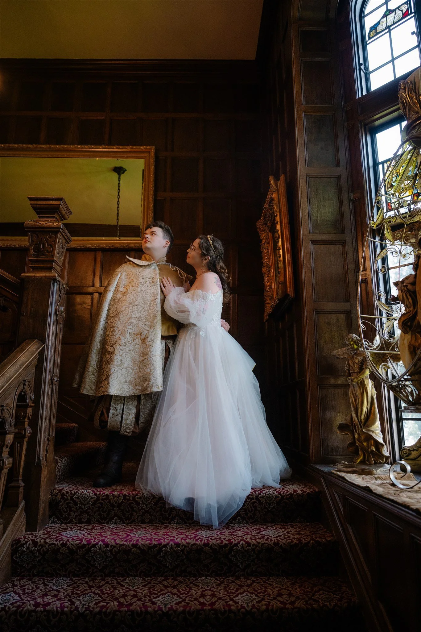 bride and groom first look on the steps at thornewood castle