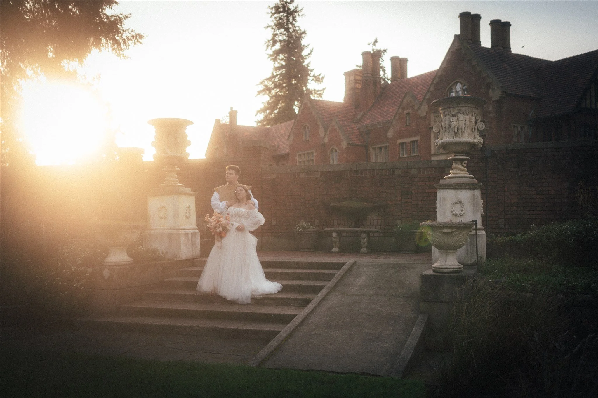 bride and groom holding hands in front of thornewood castle