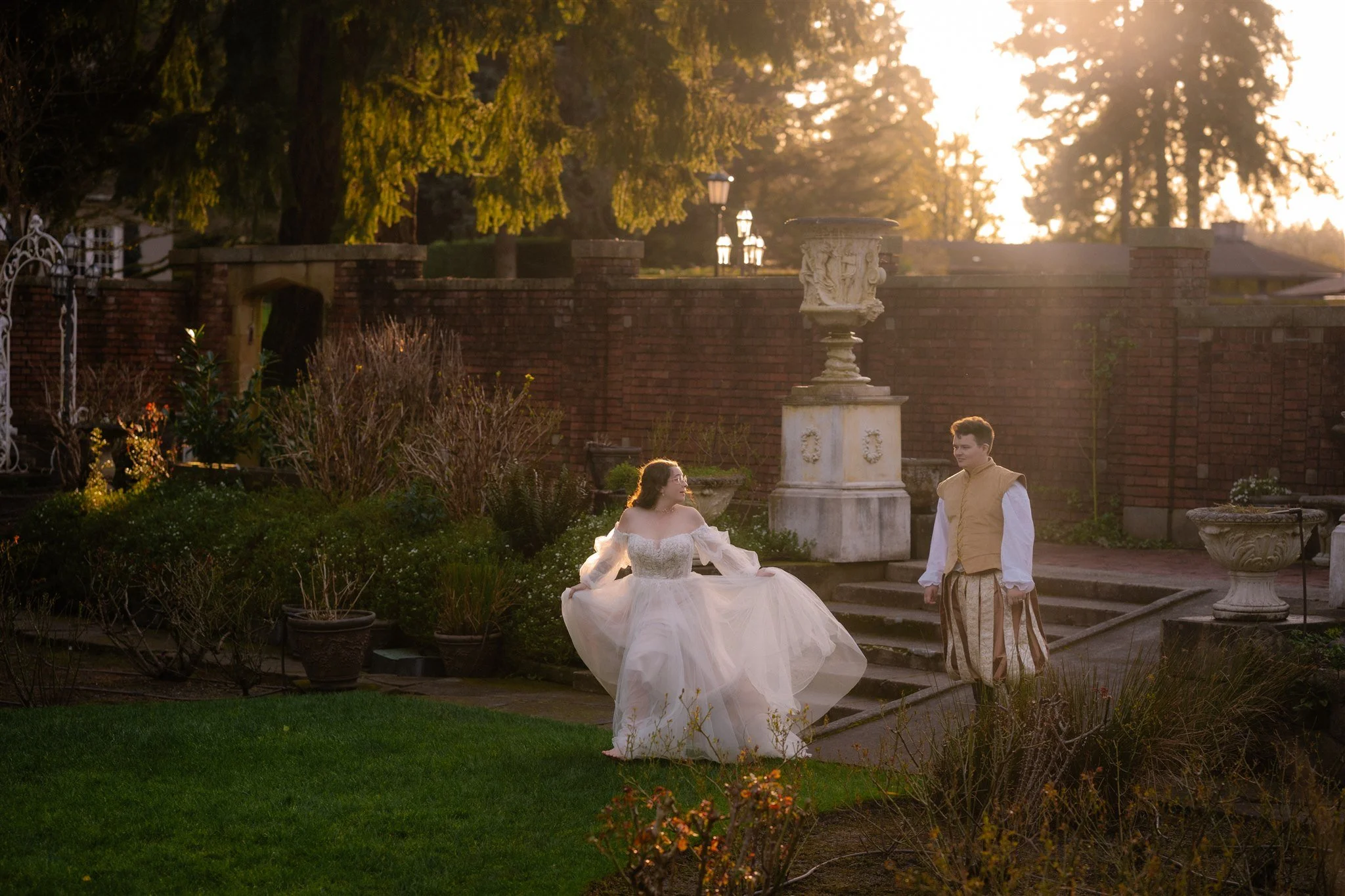 bride and groom running around the grounds of thornewood castle