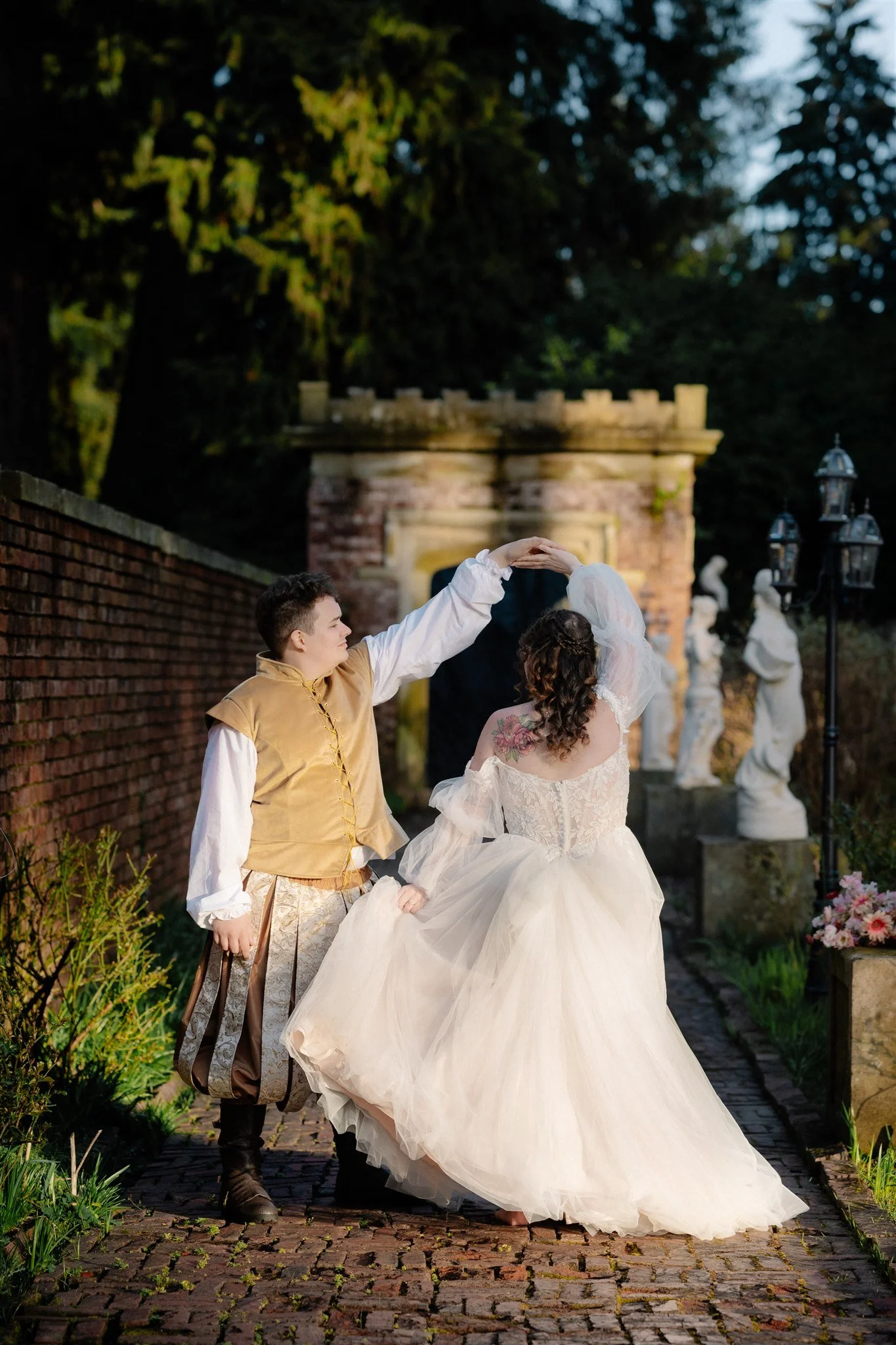bride and groom in renaissance faire themed wedding attire at thornewood castle wedding