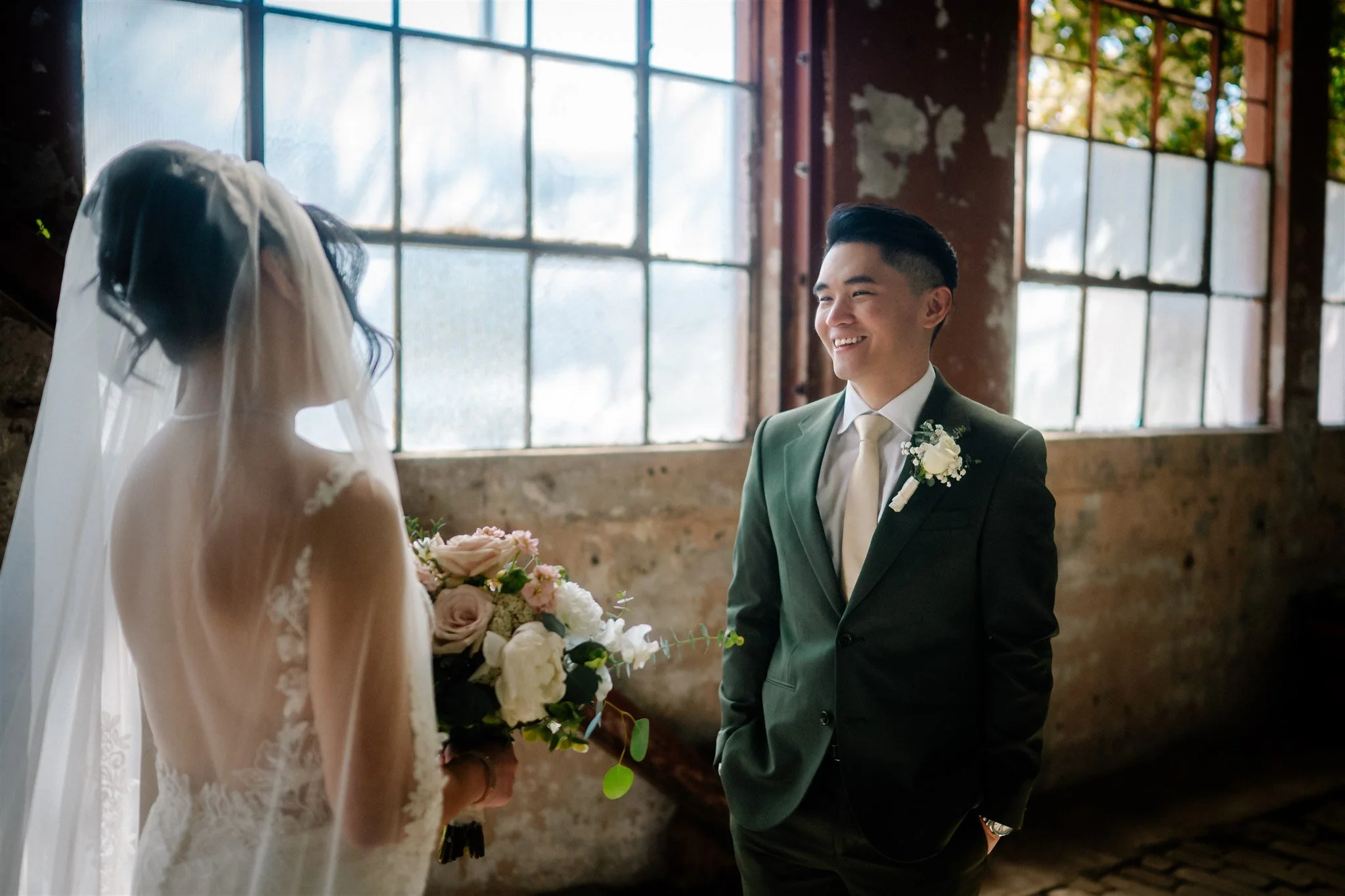 First look wedding photo at The Ruins Seattle with soft natural light
