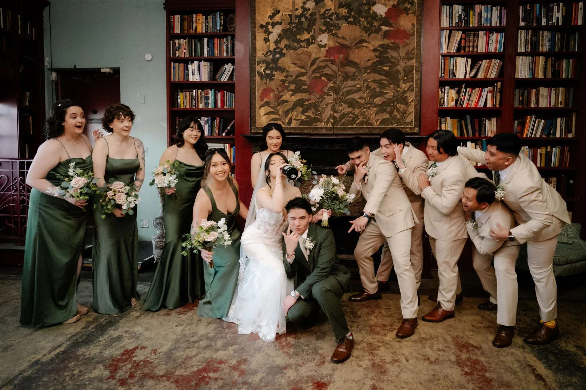 Wedding party photography with neutral suits and green wedding color palette