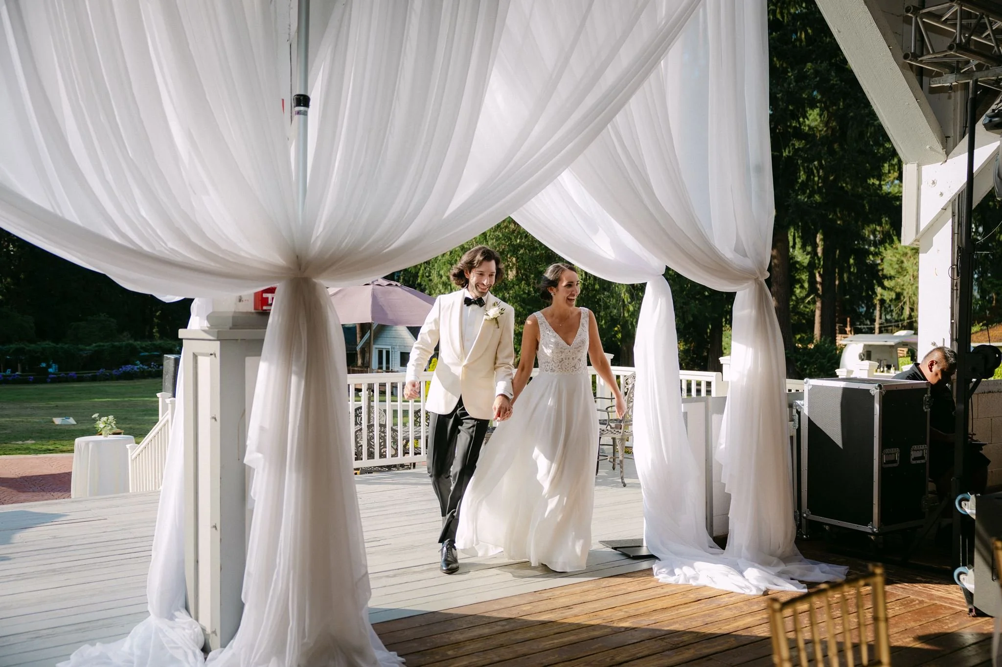 candid wedding reception moments at the rustic pavilion in carnation farms, wa