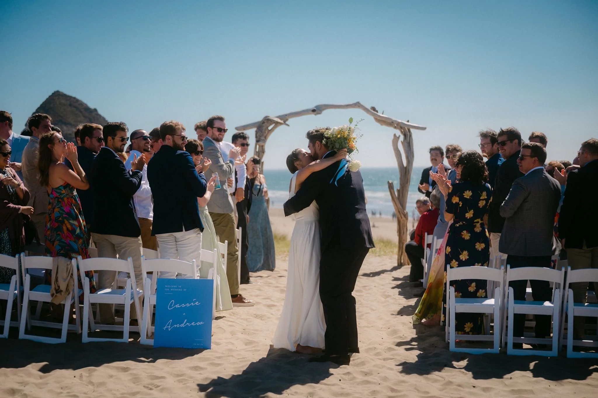 cannon beach wedding ceremony with haystack rock in the background