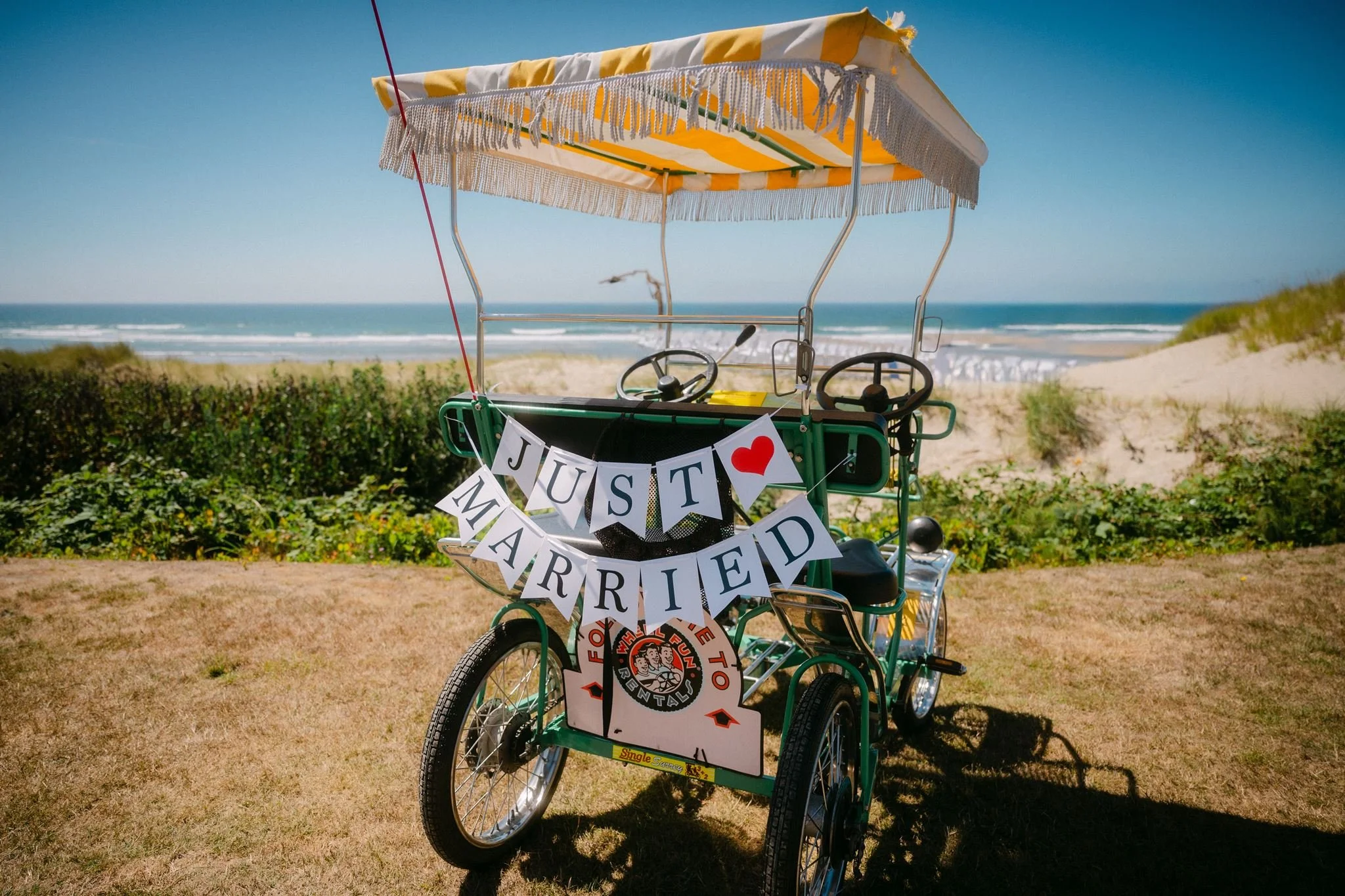 surrey bike with cannon beach backdrops