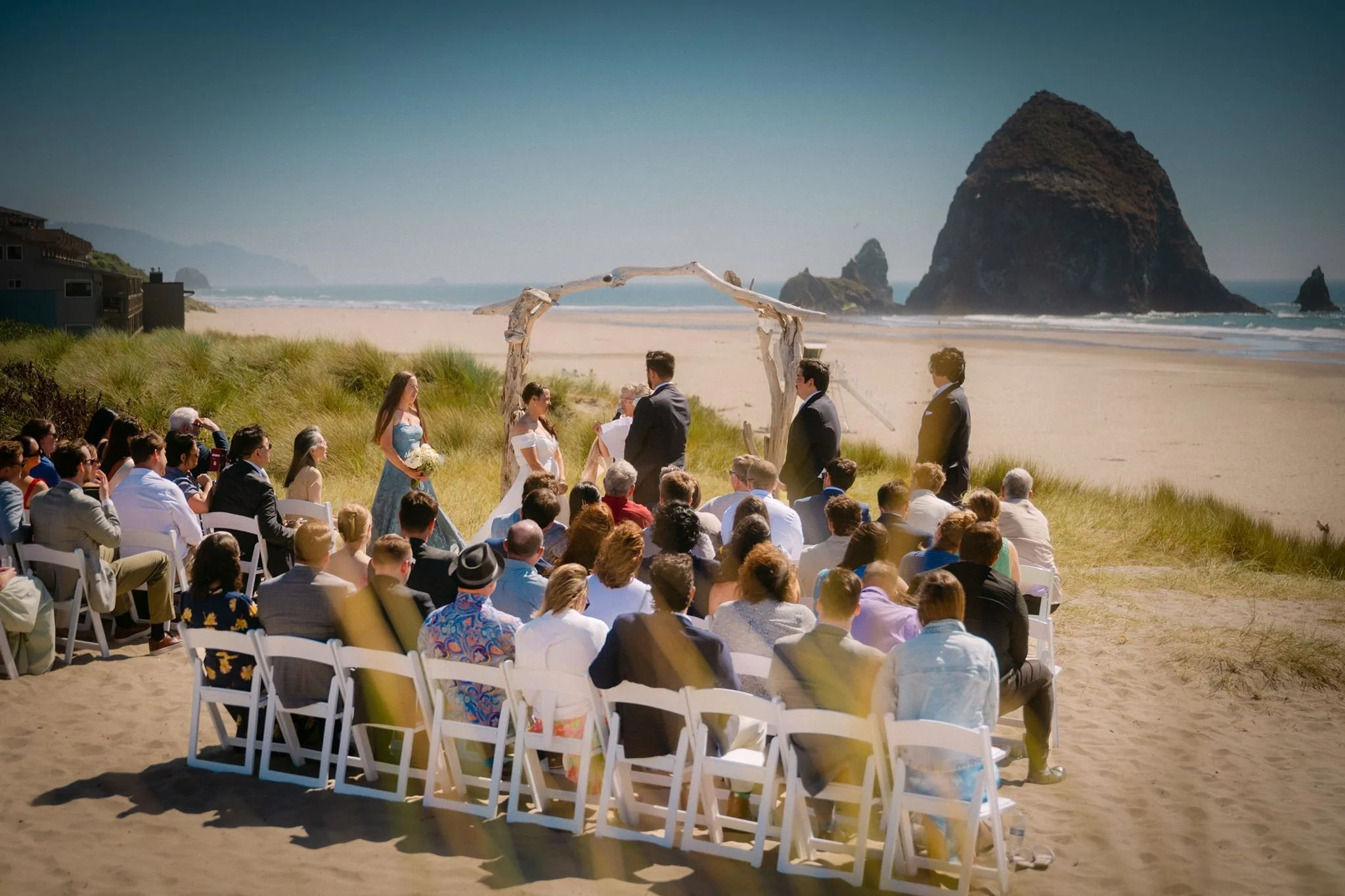 cannon beach wedding ceremony with haystack rock in the background