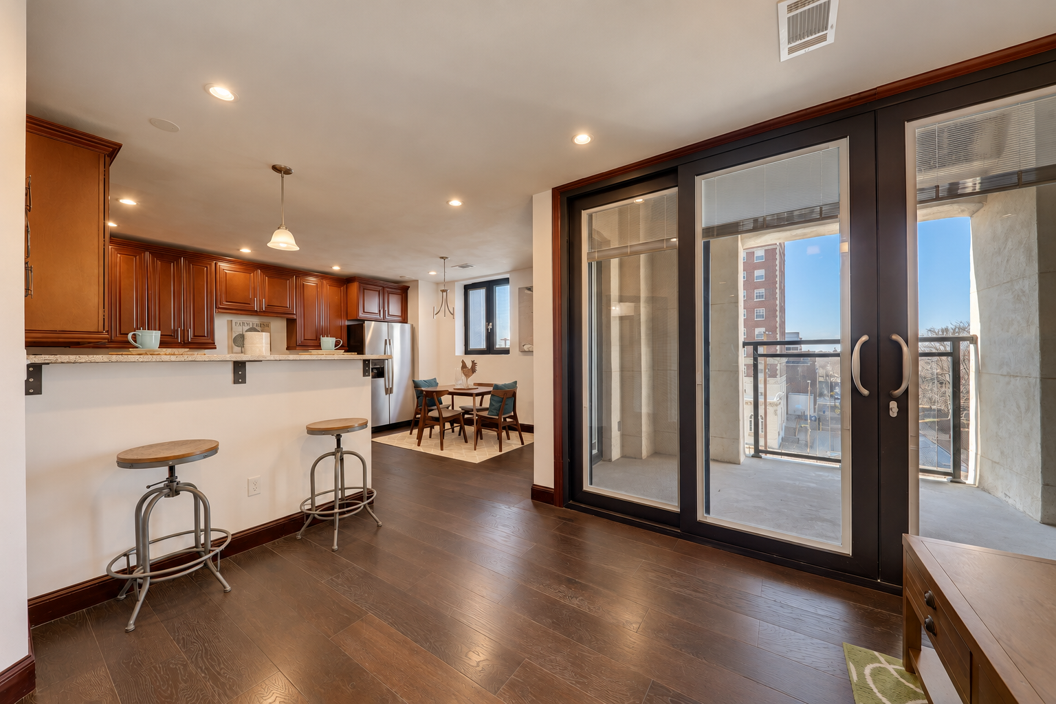 Refreshed Hardwood Open-Plan Living Space.png