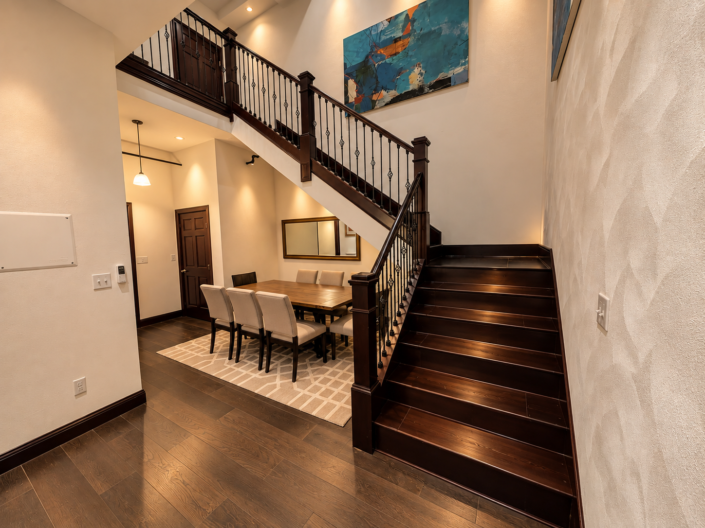 Warm Modern Foyer with Grand Staircase.png