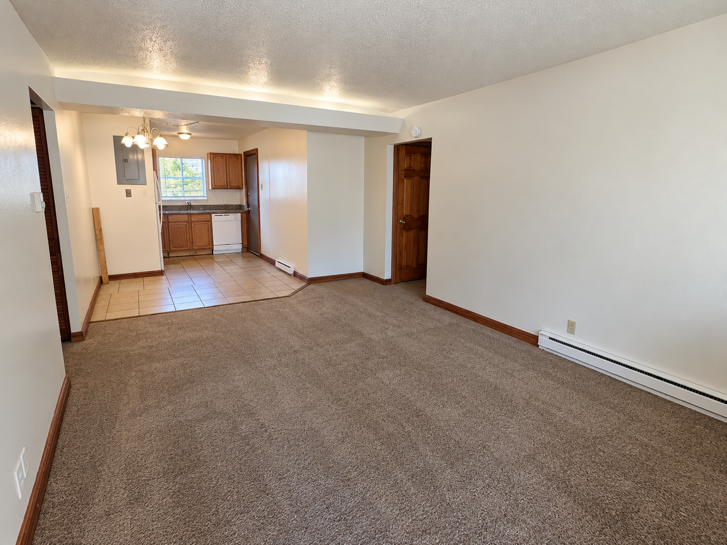 Empty Open-Plan Apartment Interior.png