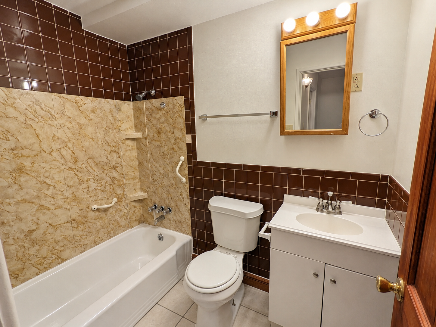 Retro Bathroom with Marble Shower and Vanity.png