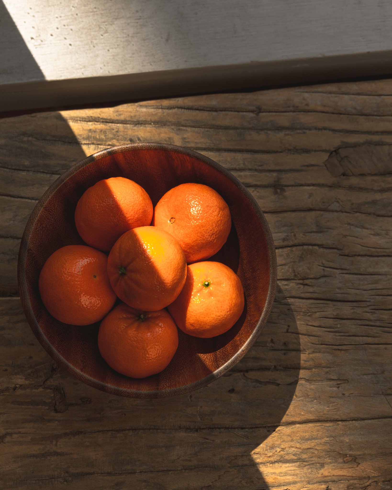 "ORANGES IN SHADOWS"