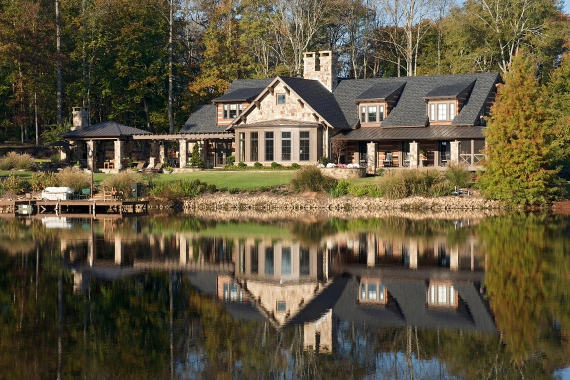 Renovation and addition to an existing family home near Lake Oconee, Georgia. The existing home was a log cabin and the new design responds to this through use of materials and massing. Project completed while employed as a project manager for Kemp Hall Studio which was the Architect of record.