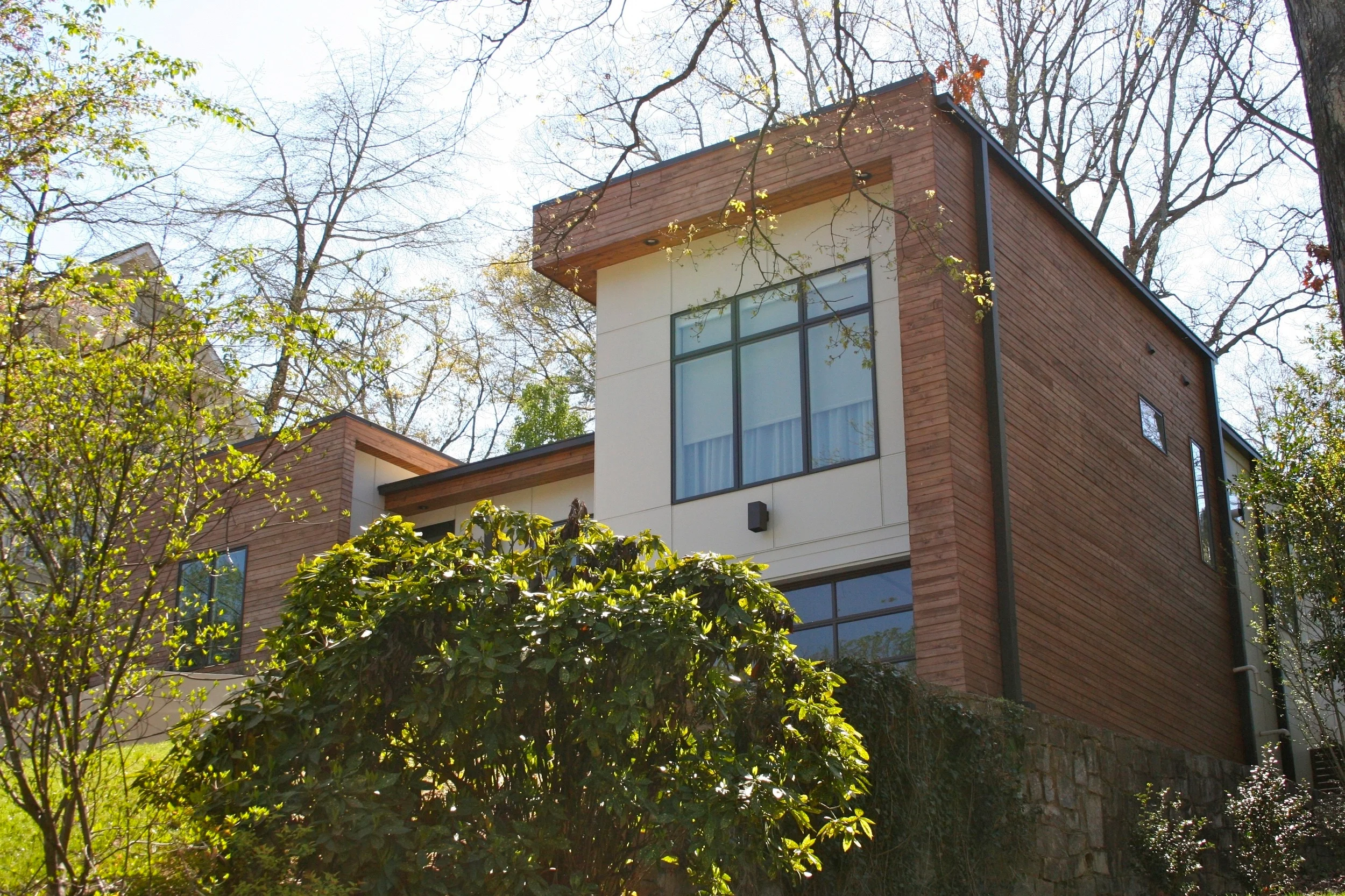 Complete renovation of 1950s 2 bedroom 1 bath home into a modern 3 bedroom and 2 1/2 bath home. The existing walls and foundation remained but the roof and exterior materials were completely reworked. Located in the Morningside neighborhood of Midtown Atlanta.