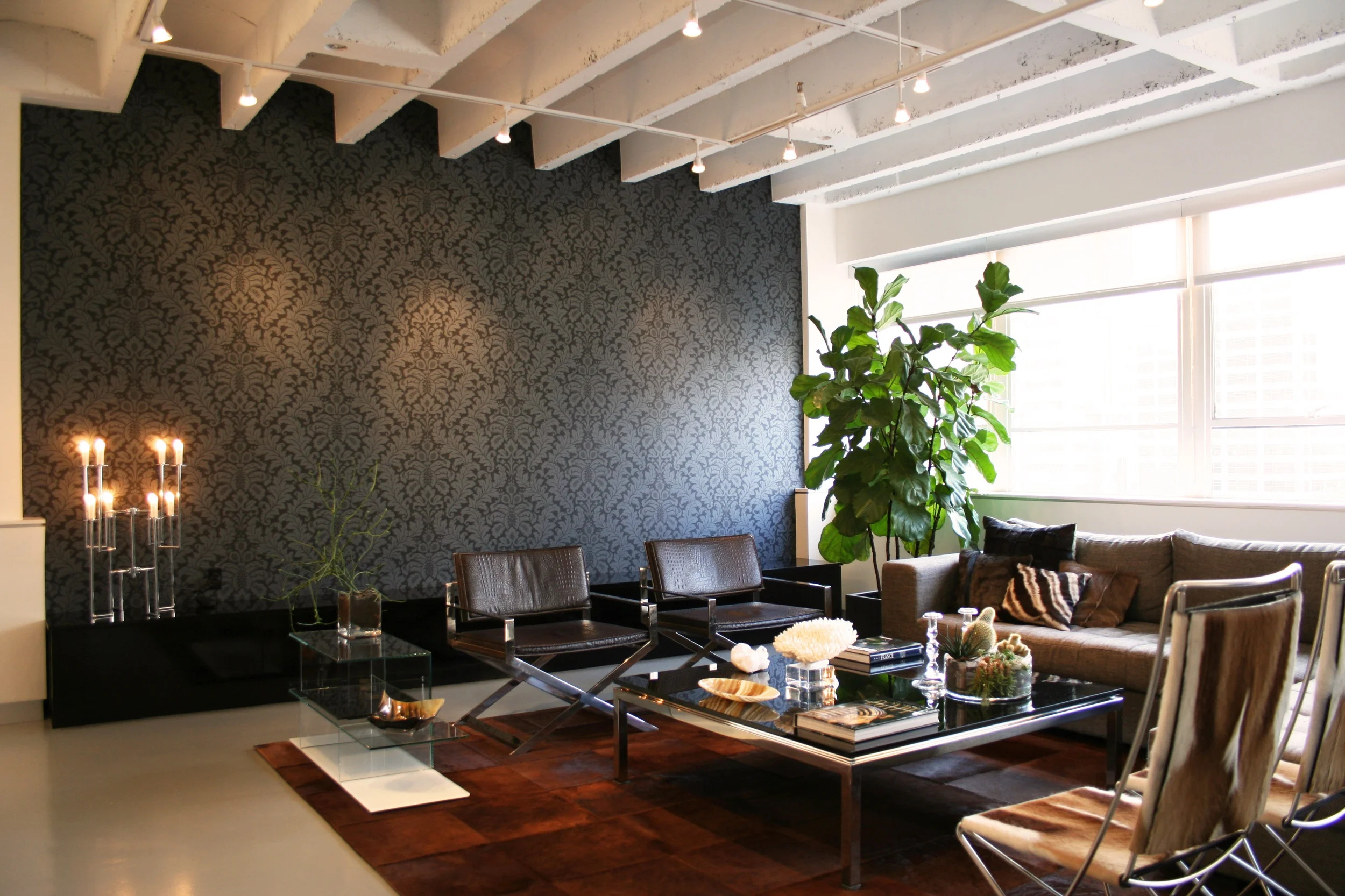 Loft Renovation in the heart of Atlanta’s Midtown shopping and entertainment district. The project involved combining a two bedroom unit with a small studio unit to create a 2000sf space. The use of glass walls and privacy drapery allows for open views throughout increasing the visual size and volume. Featured on HGTV in 2009. Project completed while employed as a Project Manager with Kemp Hall Studio.