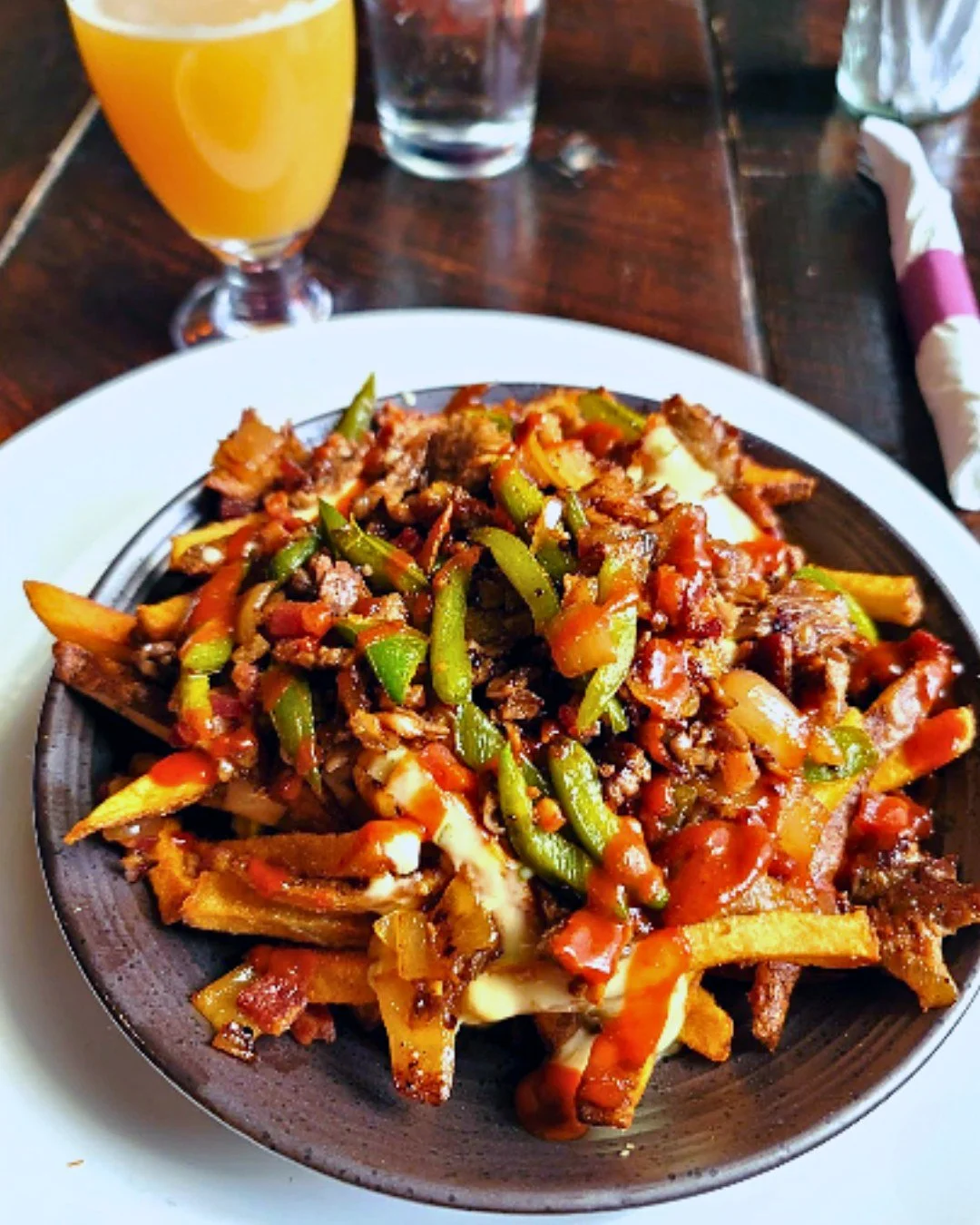 Our Carne Asada fries have no business being this good... 🤤🍟

Shaved ribeye. Crispy bacon. Jalape&ntilde;os. Cheese. Hot sauce. Fresh fries...These ain't no snack, that's a WHOLE meal right there! 🔥
~~~
#NatMechanics #NattyMacs #CarneAsadaFries #E