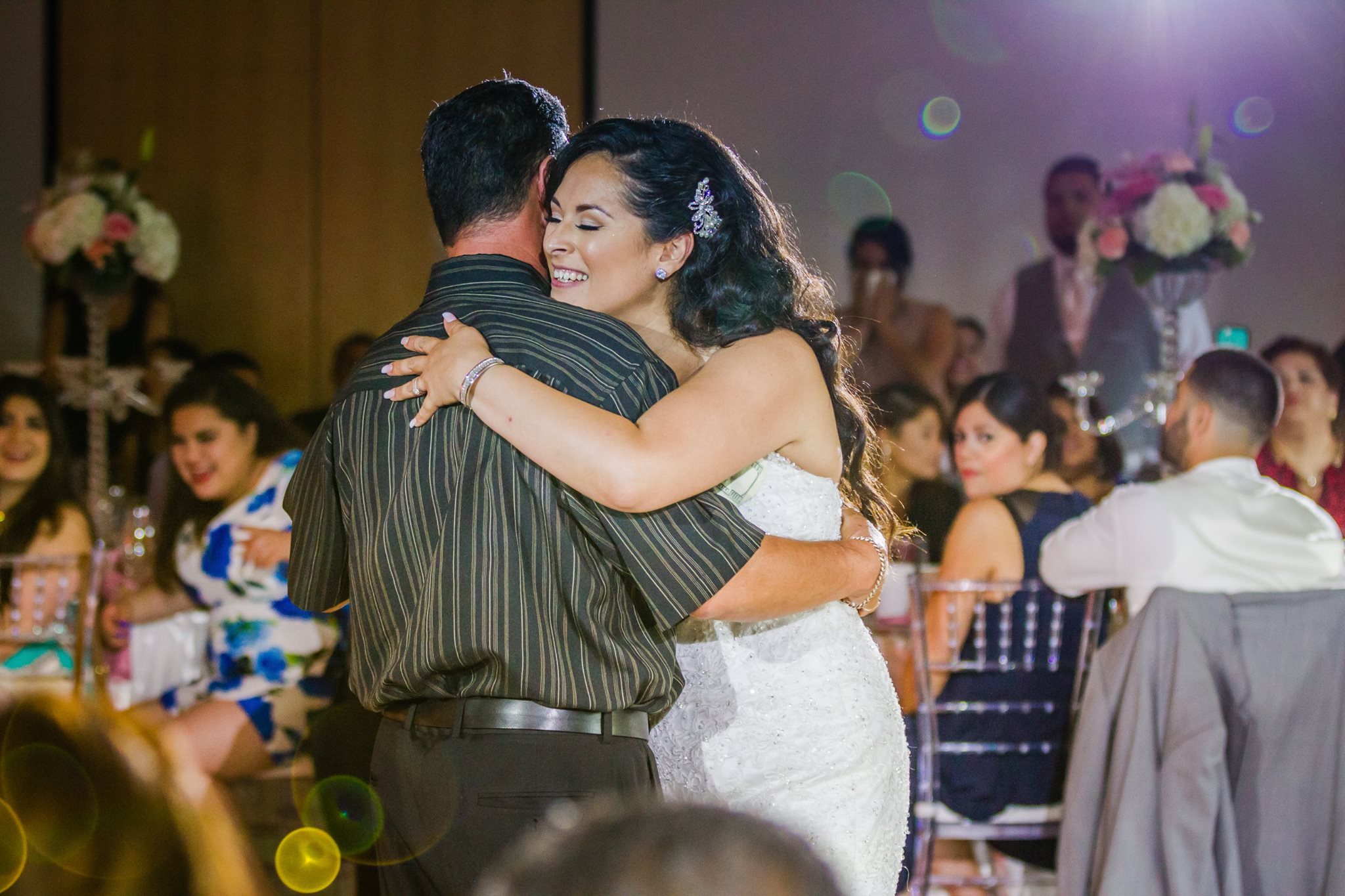 Jaquie and her father share their first dance. Reception at Arrillaga Family Recreation Center in Menlo Park. 