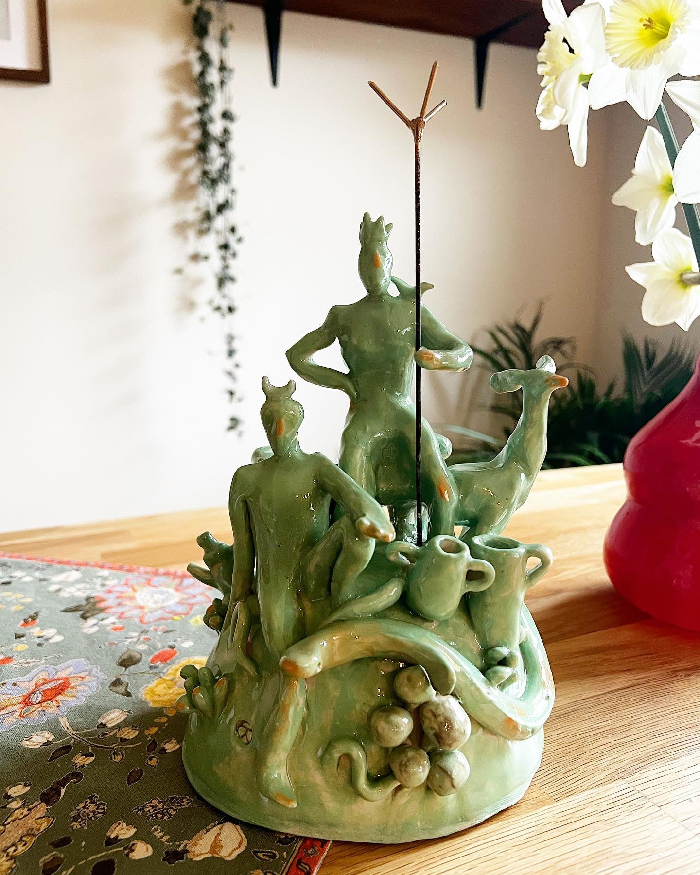 One of my drawings as a ceramics sculpture. Followed a pretty organic sculpting process of building with lumps of clay. The base is hollow. Green slip underneath with a transparent glaze. Fired by @nicolaashley1101 🙏🏽 🙂