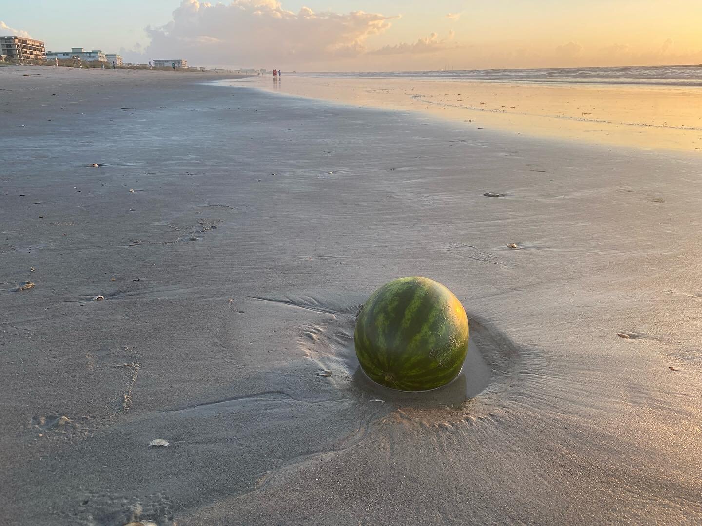 I call this one: Watermelon on the beach at sunrise. 🤷&zwj;♀️ Weird but definitely gorgeous. We&rsquo;re not sure if it was placed or washed up.