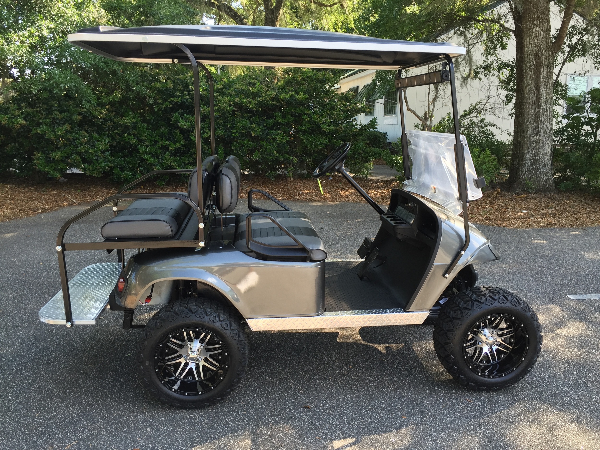2015 Charcoal EZGO Lifted Cart ——- In Stock Charcoal/black seats, black extended top, new 2019 batteries 48vt (6-8), LED lights, Backlash (23x10x14) tires, mirror & flip windshield