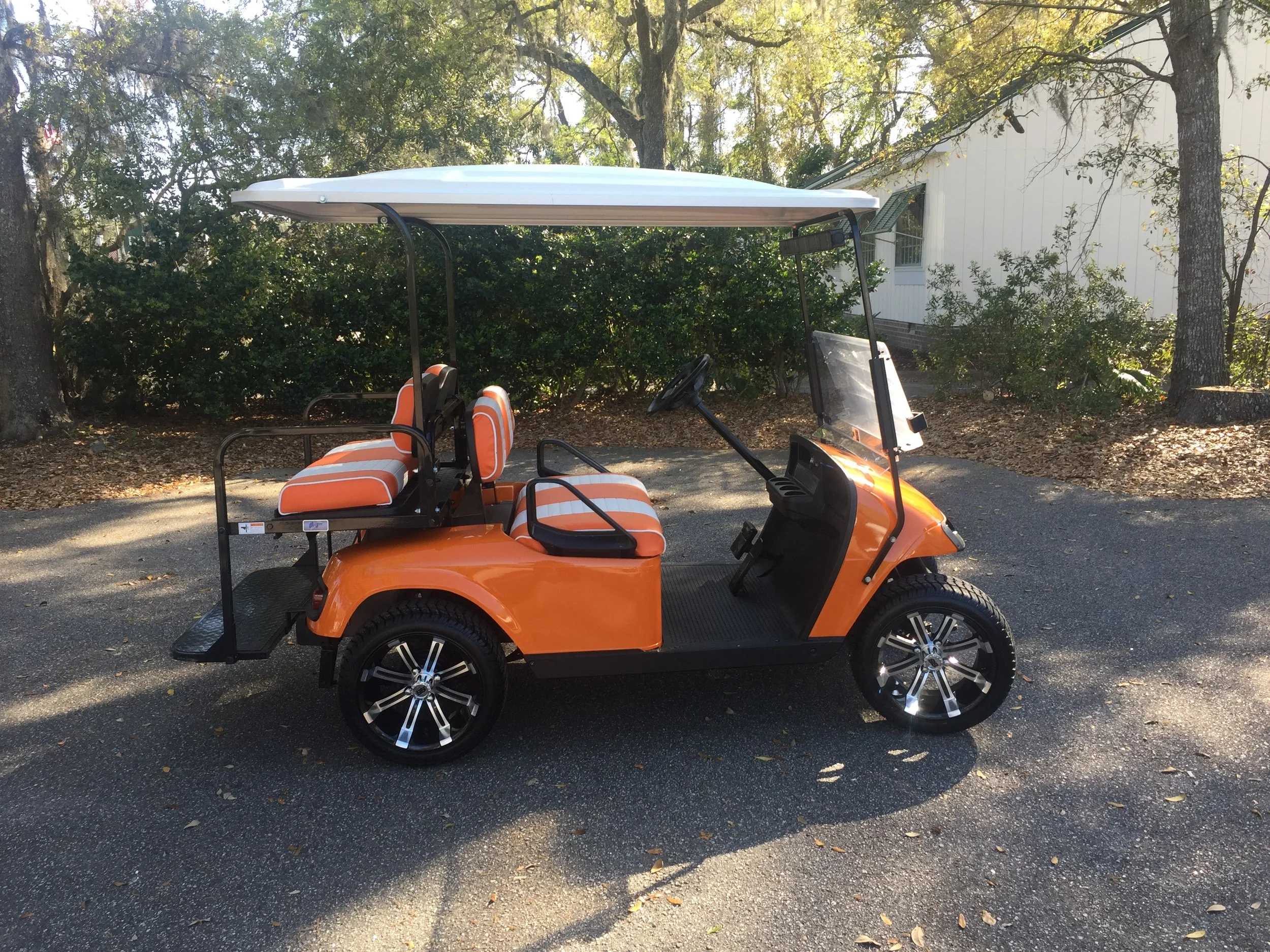 2015 Orange EZGO Cart ————— Orange/white seats, white extended top, new 2019 batteries 48vt (6-8), high speed code, LED lights, Lo Pro tires, mirror & flip windshield