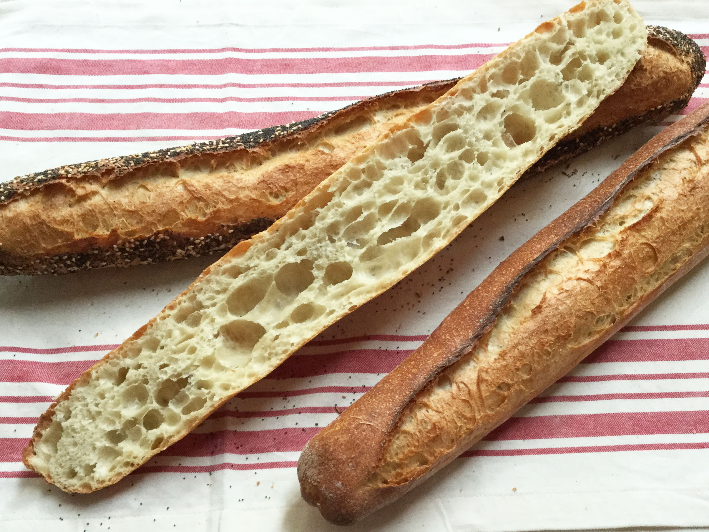 BAGUETTE A crusty exterior and light interior highlight our French-style baguette. Ingredients: Unbleached white flour, sourdough starter, sea salt, yeast, water. Also available: Seeded baguette with poppy seeds, sesame seeds and fennel.