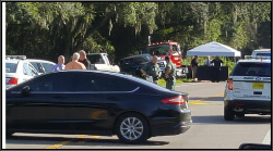 The police are staring at my son’s body under the tent behind the cloth.