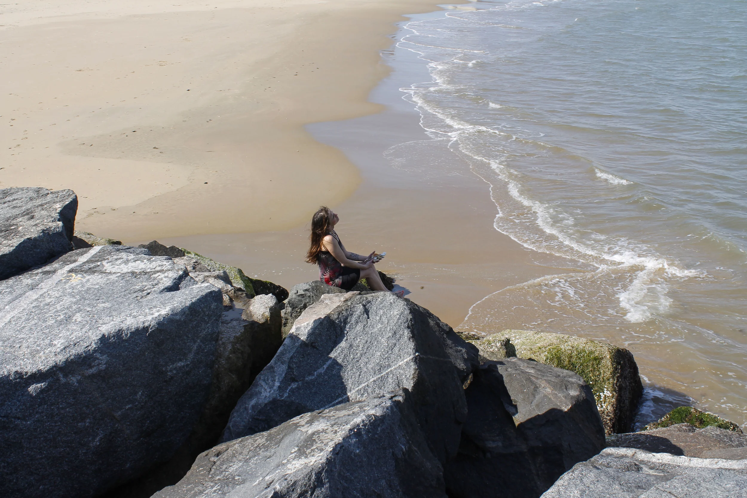 She Holds The Knife Made Up Of Shell Pieces