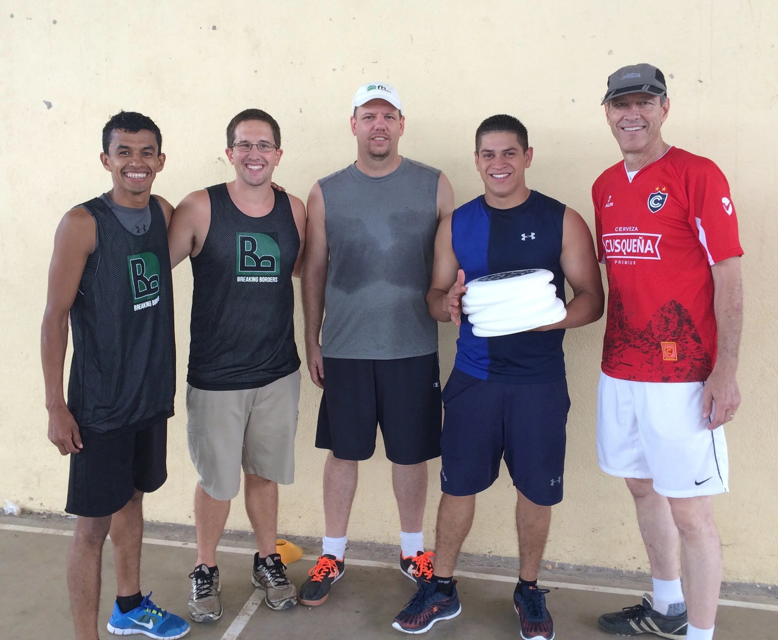 BB Staff presenting discs for the new program to NCA Matagalpa P.E. Teacher Otoniel Martinez, and Directors Greg Kynast and Nathan Sandhal, 
