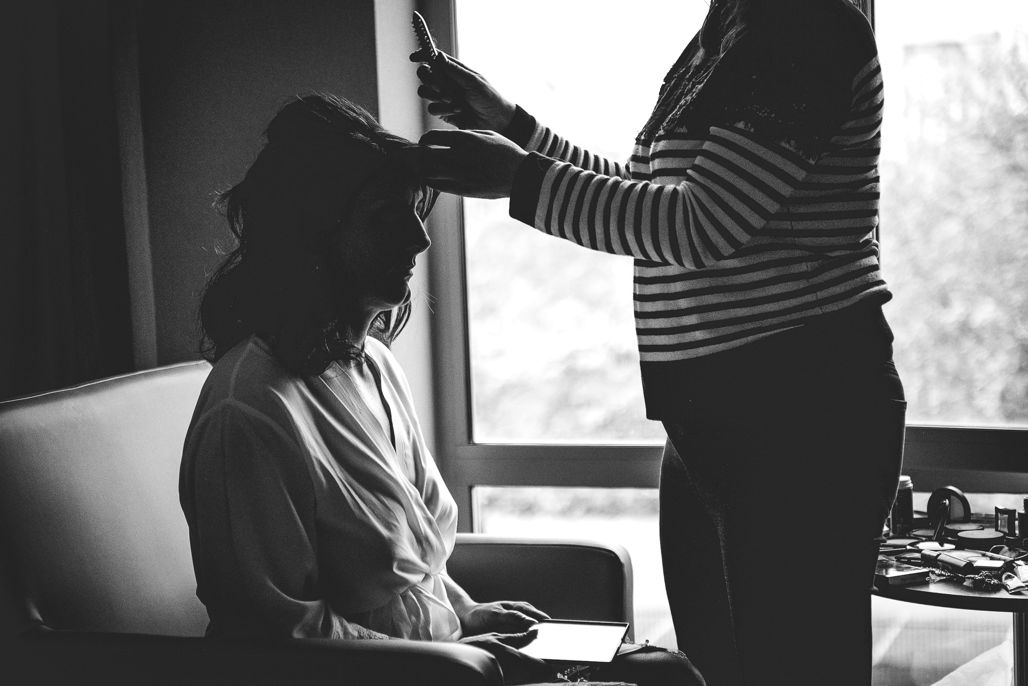 Final touches to the bride's hair