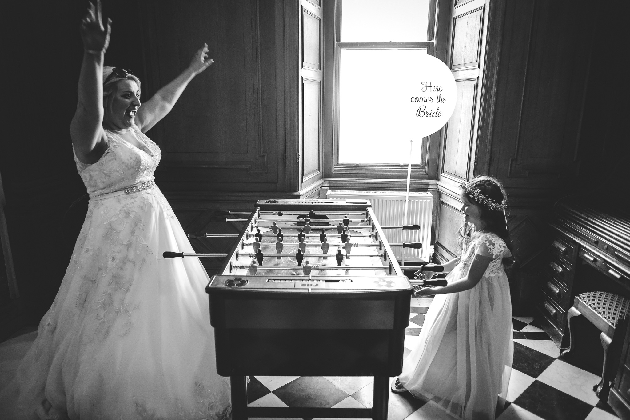 Bride playing table football