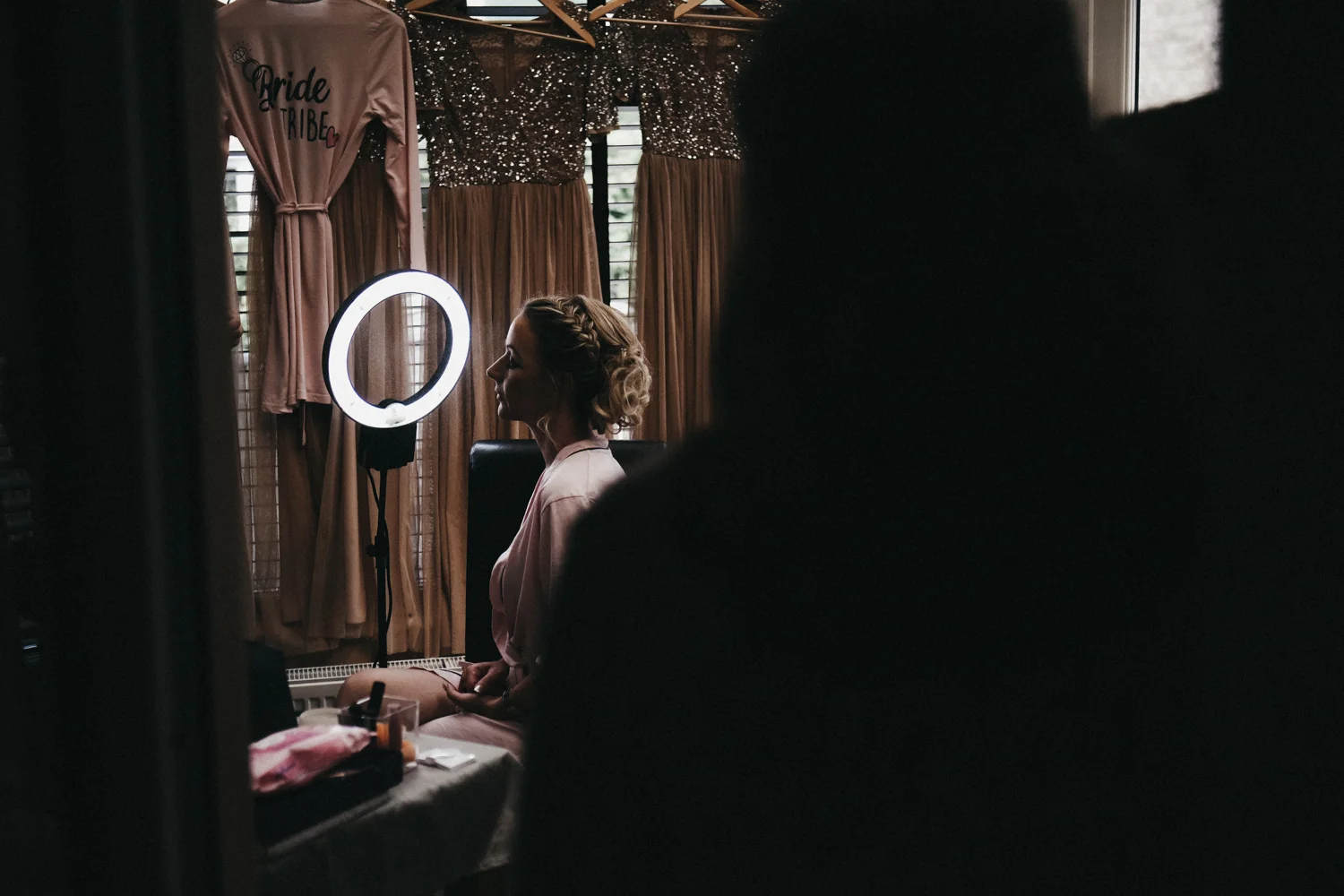 Bridesmaid having make up applied